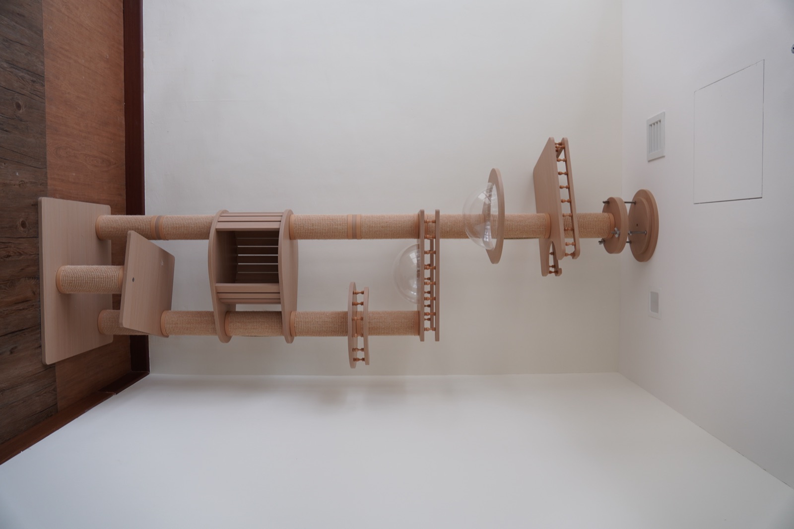 Cat tree inside a MoonCat hotel room